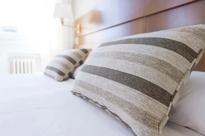 5. A Better Pillow, Extra Bedding, or a Wellness Kit (Image Credits: Unsplash)