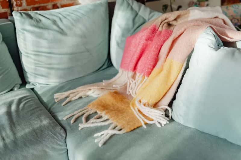 A Light Layer or Small Blanket (Image Credits: Pexels)