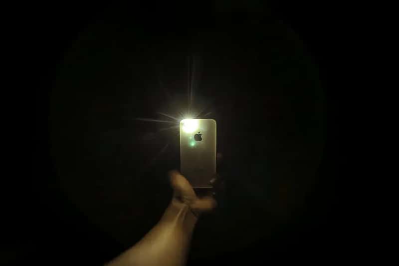 6. Your Flashlight or Phone Camera Picks Up Unusual Reflections or Infrared Light (Image Credits: Pexels)