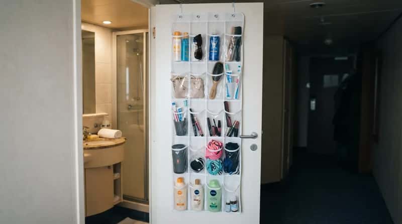 #6 - Hang an Over-the-Door Organizer the Moment You Board (Image Credits: Gemini)