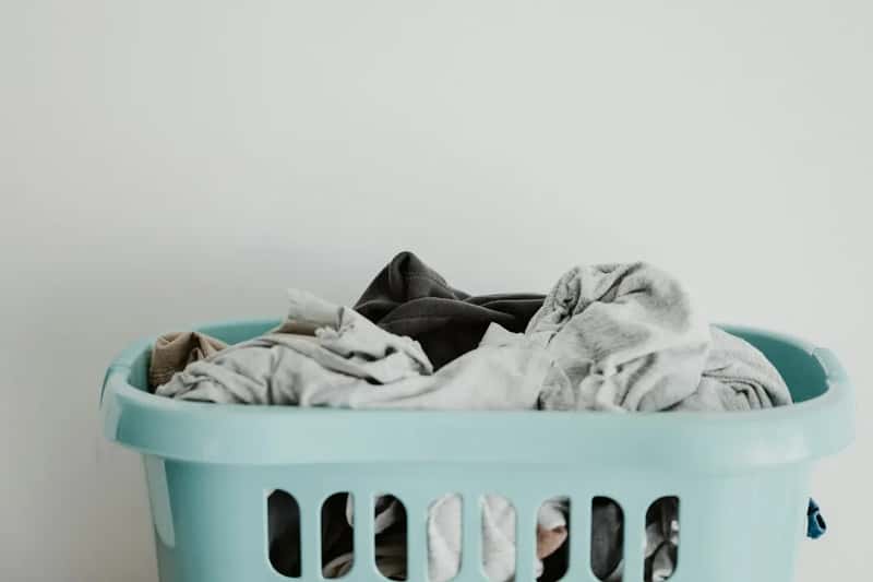 12. Travel-size laundry detergent and clotheslines (Image Credits: Unsplash)