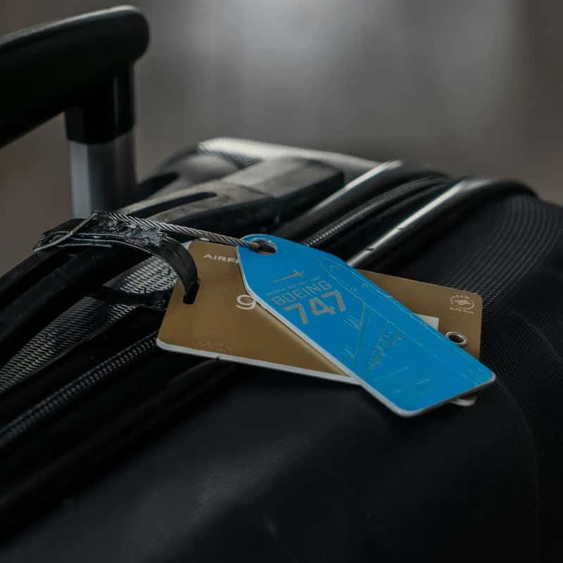 3. Loyalty Tags and Worn Travel Gear (Image Credits: Unsplash)