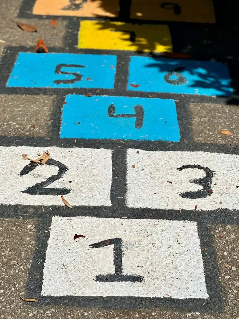 #4 - Playing Hopscotch and Jump Rope With the Whole Block Involved (Image Credits: Unsplash)