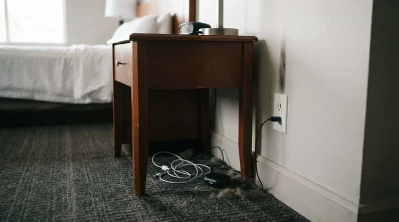 #5 - The Outlet Behind the Nightstand (Image Credits: Gemini)