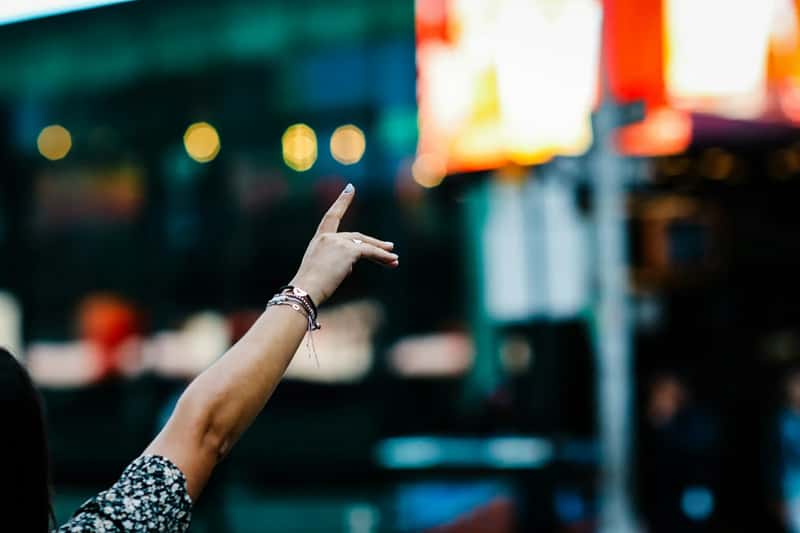 Snapping, Whistling, or Waving the Server Down (Image Credits: Unsplash)