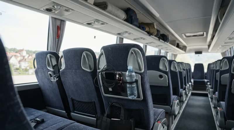 7. Do a 60-Second Seat and Overhead Bin Sweep (Image Credits: Gemini)