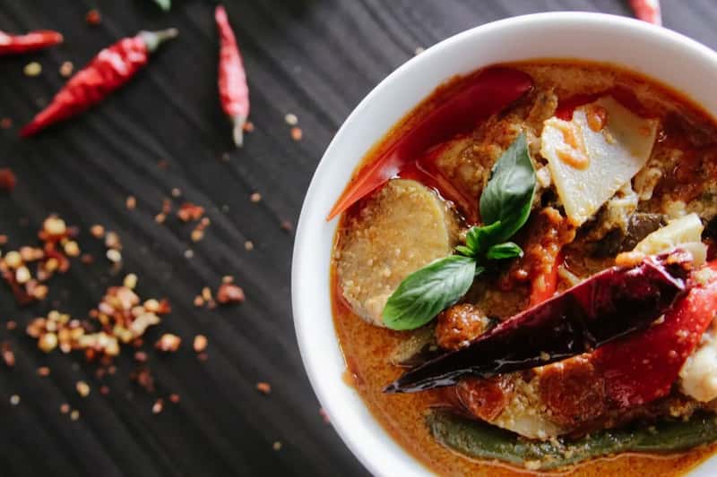 Ghee and coconut cream heavy curries from South Asia (Image Credits: Unsplash)