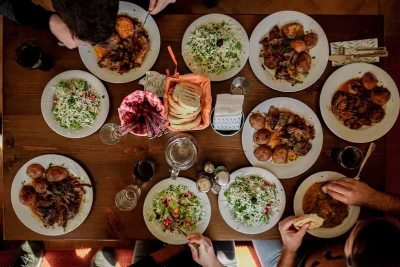 2. Long, unhurried meals as the default (Image Credits: Unsplash)