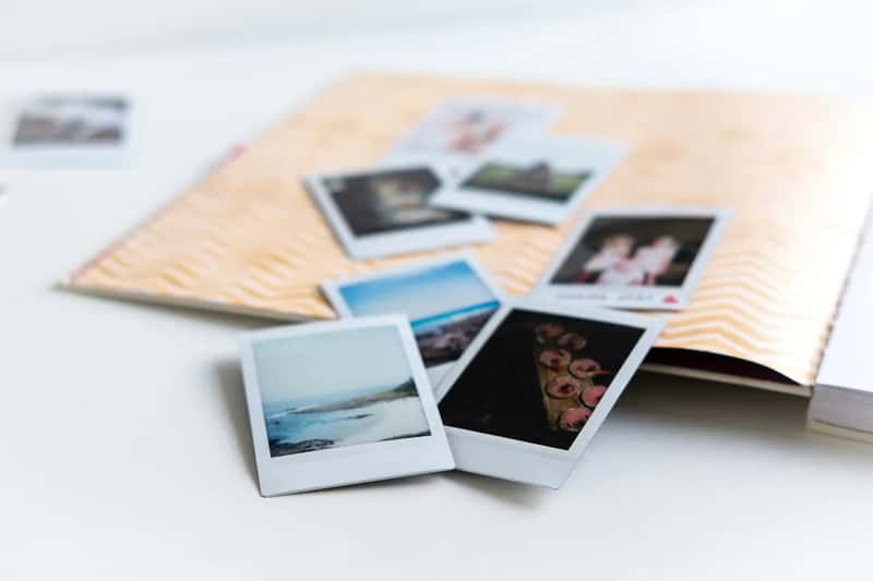 6. Travel photo albums and slides (Image Credits: Unsplash)