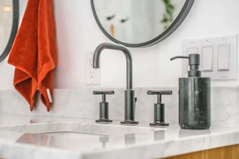 8. The Bathroom Sink and Faucet Handles (Image Credits: Unsplash)