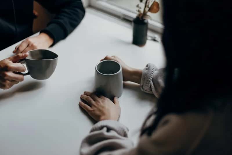 7. Filling every silence with small talk (Image Credits: Unsplash)