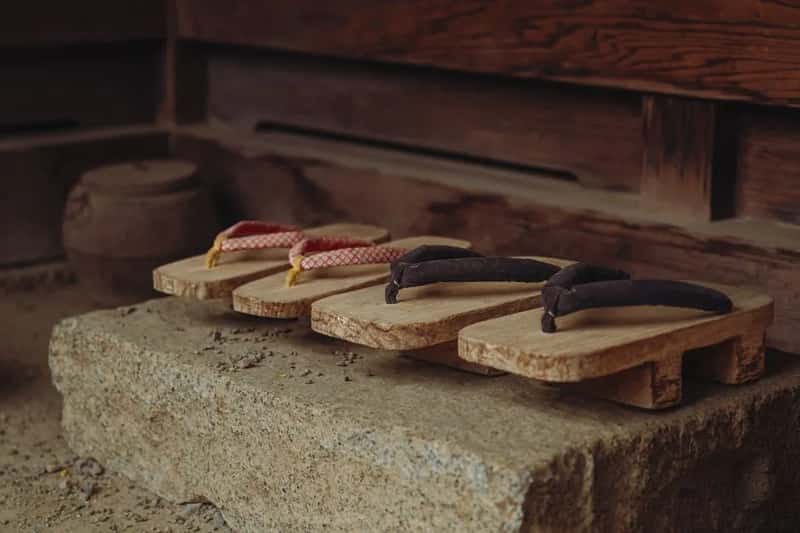 1. Shoes come off the moment you step inside (Image Credits: Pexels)
