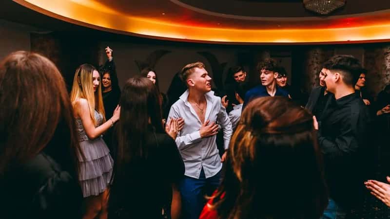 Dancing, singing, or joining group activities (Image Credits: Pexels)