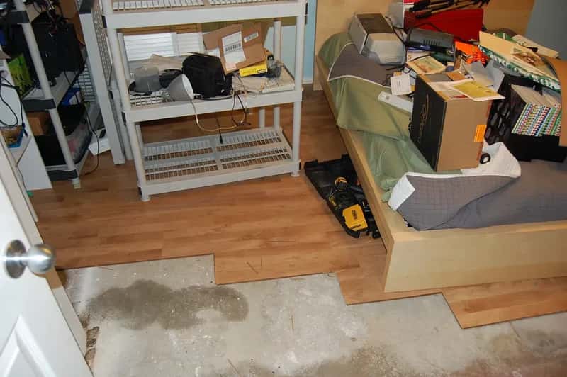 #9 - A Cluttered Floor Path Between the Bed and the Bathroom (Moresheth, Flickr, CC BY 2.0)