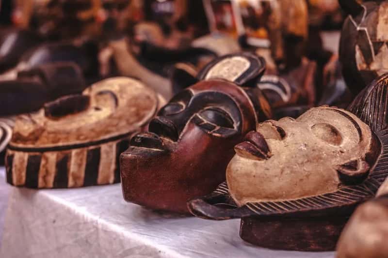 1. "Authentic" tribal masks and carvings sold at tourist markets (Image Credits: Pexels)