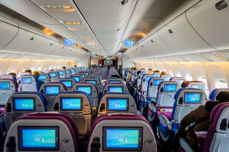 Full-fare business class on routes where premium economy exists (Image Credits: Unsplash)