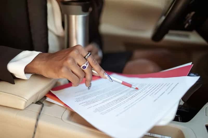 8. Your car title or ownership documents (Image Credits: Pexels)