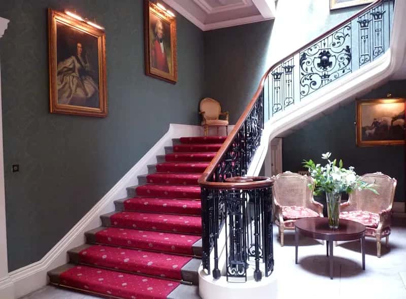 #2 - Staircases With Only One Handrail - or None at All (By Addington Palace, CC BY-SA 3.0)