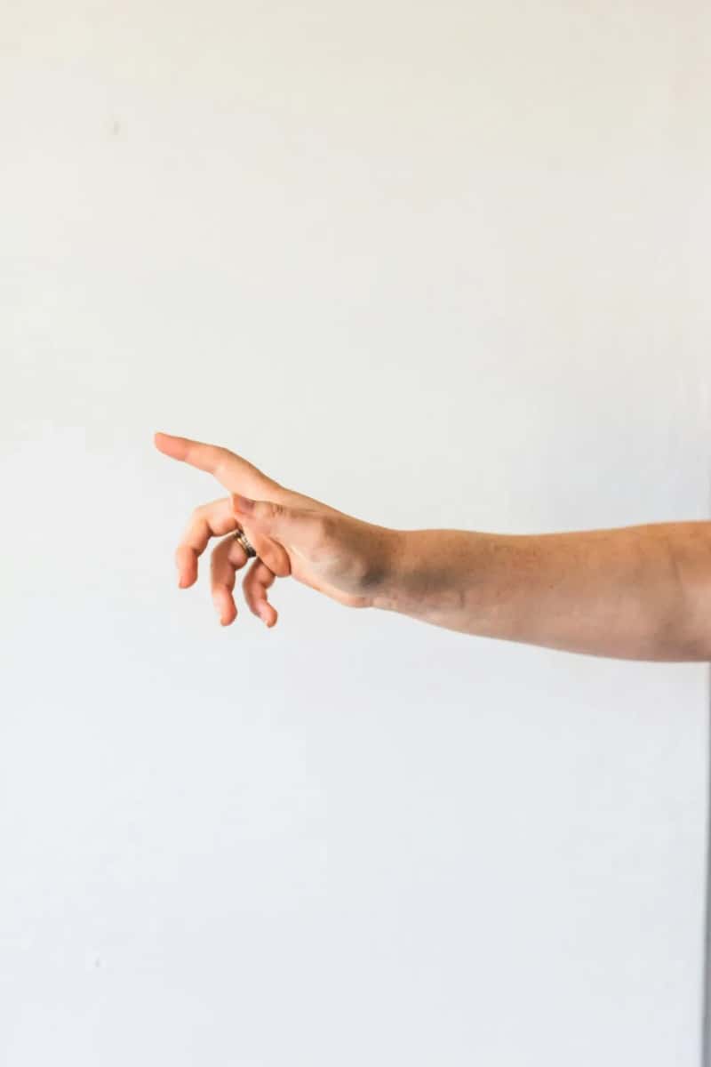 9. Avoid pointing with your finger (Image Credits: Unsplash)