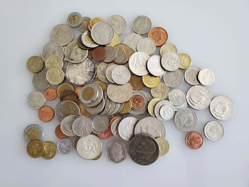 2. Foreign currency and coins (Image Credits: Unsplash)