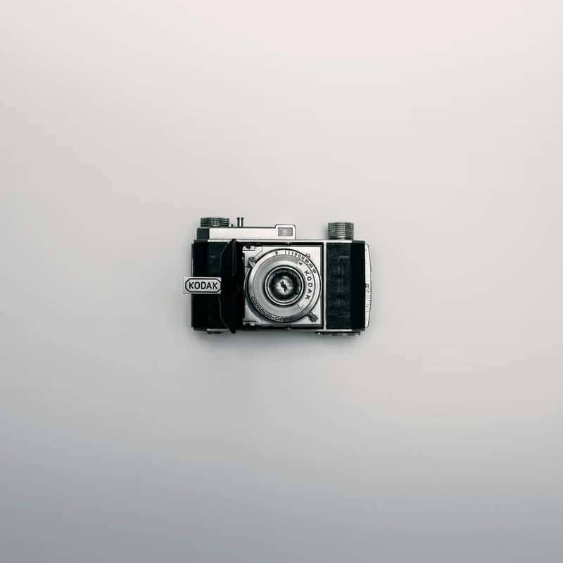 2. A film camera or a compact point-and-shoot (Image Credits: Unsplash)