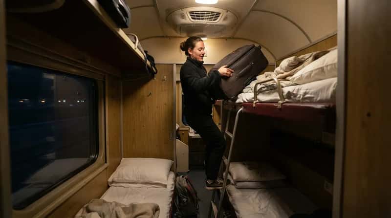 6. The Top Bunk Is Secretly the Worst Seat on the Train (Image Credits: Gemini)