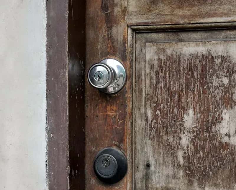 3. A Damaged or Tampered Door Lock (Image Credits: Pexels)