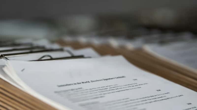 Age 75 Often Brings Extra Paperwork (Image Credits: Unsplash)