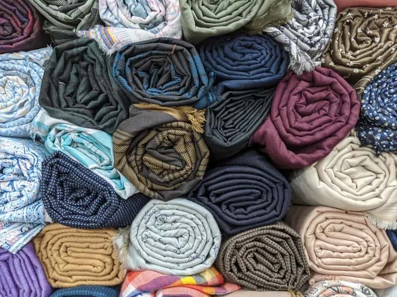 #11 β Folding Clothes Flat Instead of Rolling Them (Image Credits: Pexels)