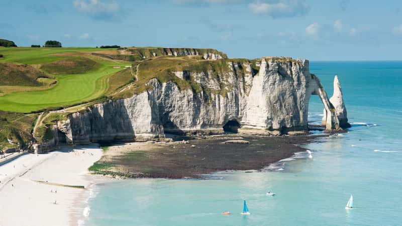 Beach with cliff Falaise d'Aval. Normandy, Cote d'Albatre, France.