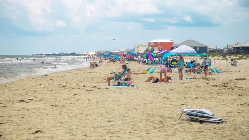  busy summer beach day in Dauphin Island, Alabama.