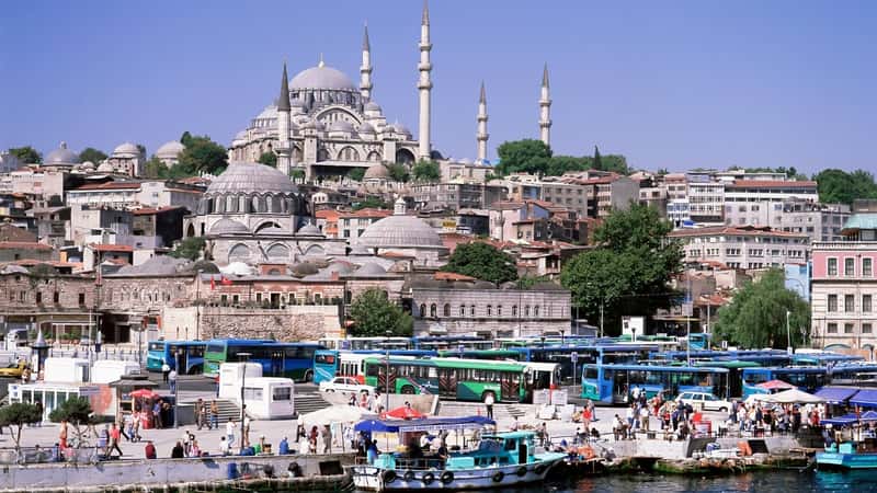 A view of Eminonu, the port area in Istanbul, Turkey, situated in Europe. The image captures the landscape featuring the port infrastructure, with vessels visible in the harbor.