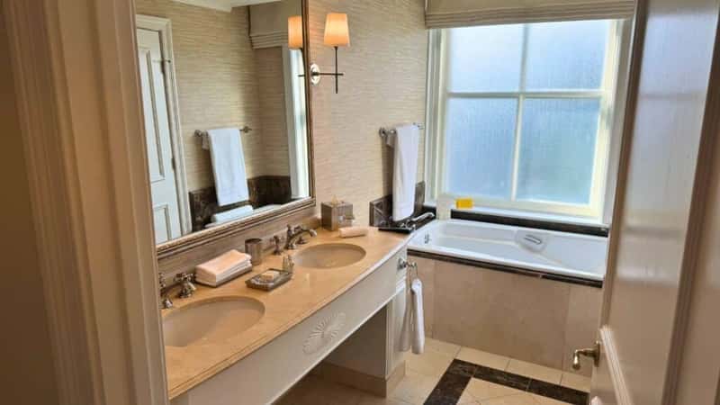 Bathroom with Two Sinks and Soaking Bathtub