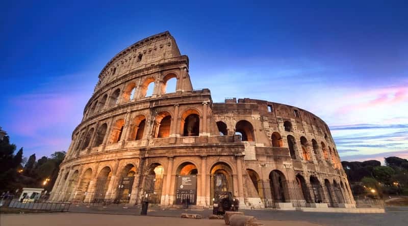 Colosseum in Rome. The image features the majestic amphitheater. The Colosseum's distinctive arches and tiers showcase the architectural brilliance of its time.