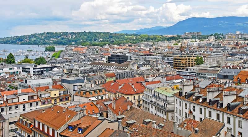 A sweeping aerial view captures the cityscape of Geneva, a city that gracefully straddles the border of Switzerland and France. The architecture seamlessly blends the charm of the old with the modern, creating a captivating urban tapestry.