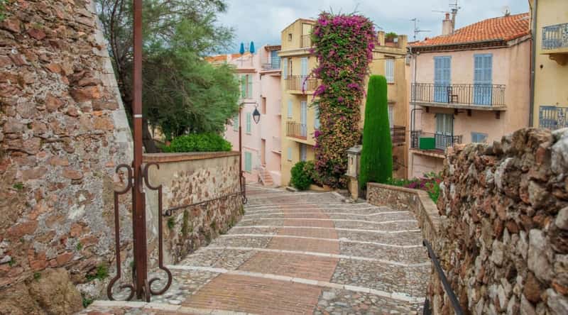 The descent from Le Suquet down a cobblestone step path in Cannes France.