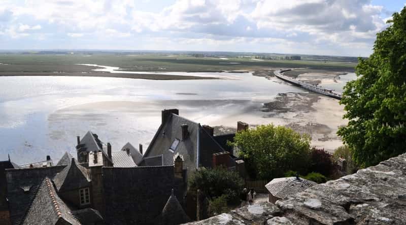 Views from the Mont Saint Michel monastery looking down over the bay as tides come back in. 