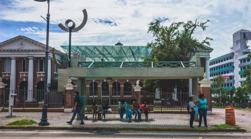 A photograph featuring the Museo de Arte Contemporaneo in Puerto Rico. The building exhibits contemporary design elements and is situated in a urban setting. The landscaping around the museum appears well-maintained.