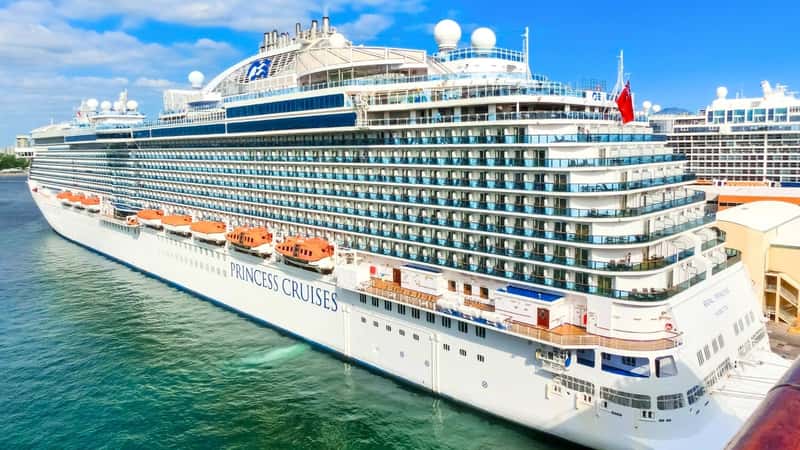 The image shows the Regal Princess cruise ship docked at Port Everglades in Fort Lauderdale, Florida. The ship's hull is prominently labeled "Princess Cruises."