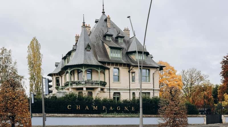 Exterior view of the famous Villa Demoiselle after its restoration on a cloudy day.