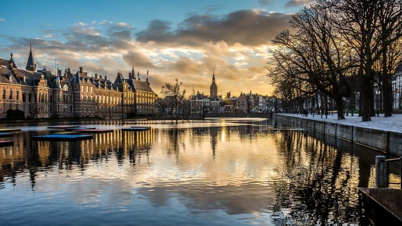 Binnenhof Palace in The Hague (Den Haag) along the Hohvijfer canal, The Netherlands - Dutch Parliament buildings.