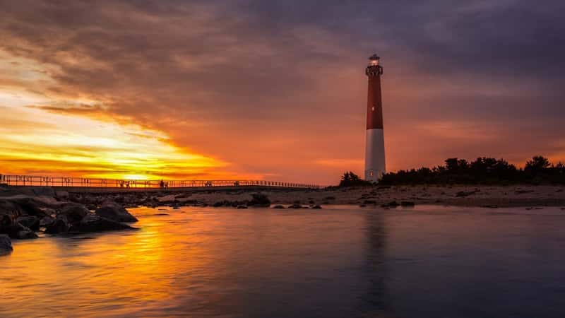Barnegat Lighthouse at sunset. Barnegat Lighthouse is a historic landmark located on the northern tip of Long Beach Island.