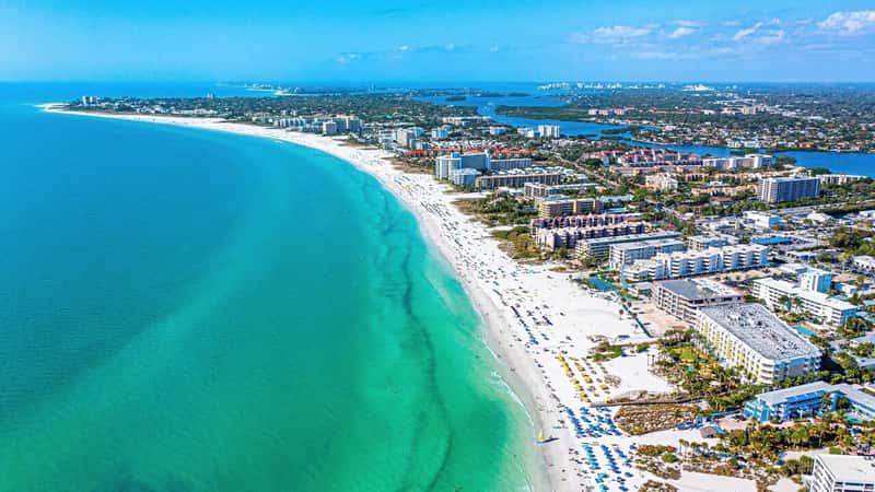 Siesta Key Beach Sarasota Florida Beautiful Sunny Day With Bright Blue Water During Spring Break Tourist Season Boaters Vacation White Sands