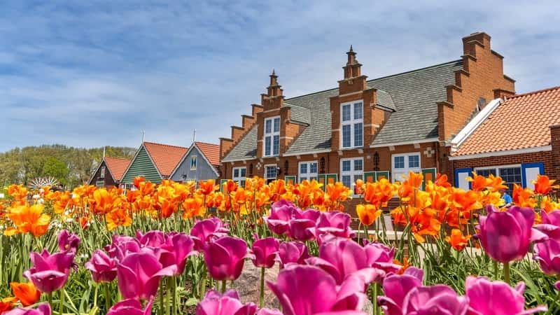 Exterior view of historic Dutch style shops at Windmill island gardens in Holland, Michigan.