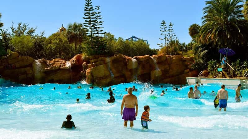 Aquatica water park, Orlando, Florida, USA - October 23, 2016: Tourists in Big Surf Shores adventure play area in Aquatica water park