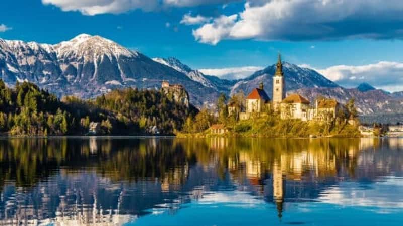 Amazing View On Bled Lake, Island,Church And Castle With Mountain Range