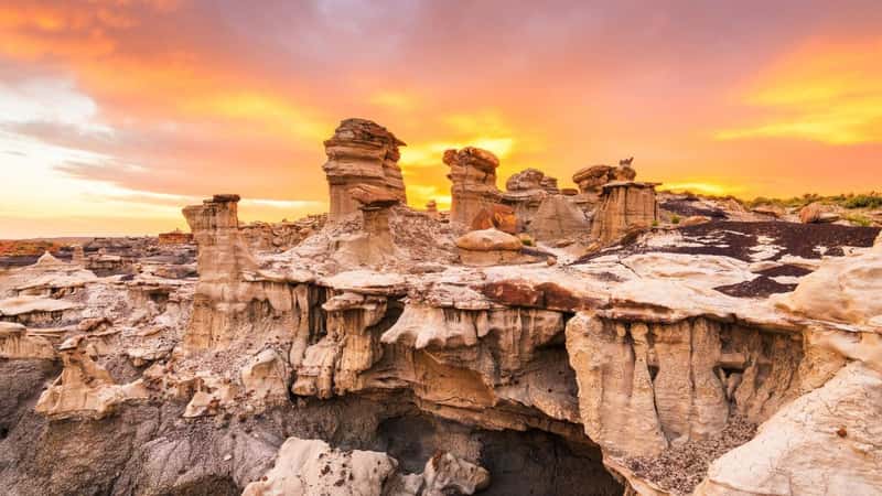 Bisti/De-Na-Zin Wilderness, New Mexico, USA at Valley of Dreams after sunset.