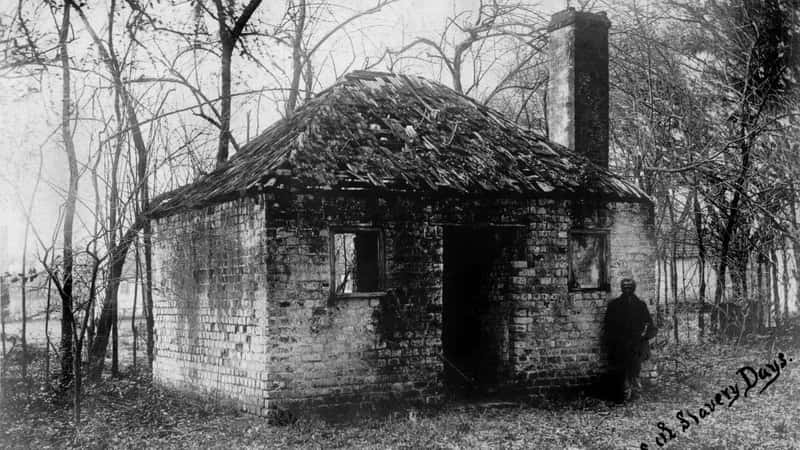 Slavery, original title: 'Relics of slavery days', Slave quarters at the Hermitage Plantation outside of Savannah, Georgia, 1900.