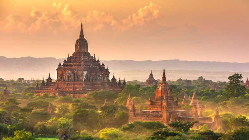Bagan, Myanmar temples in the Archaeological Zone at dusk.