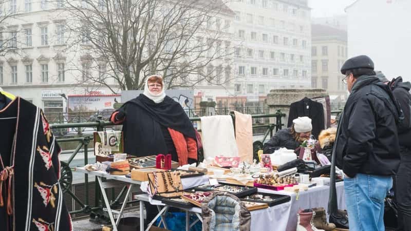 VIENNA, AUSTRIA - JANUARY, 9: Market stall with antiquities at flea market Naschmarkt in Vienna, Austria, on a foggy day. Shot in winter of 2016